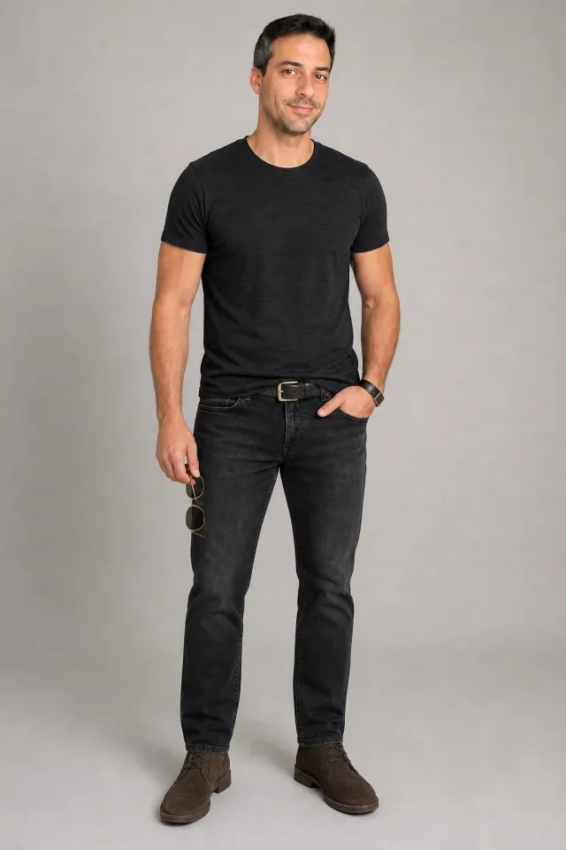 Restyled look: black tee, washed black jeans, the same suede chukka boots and black leather accents